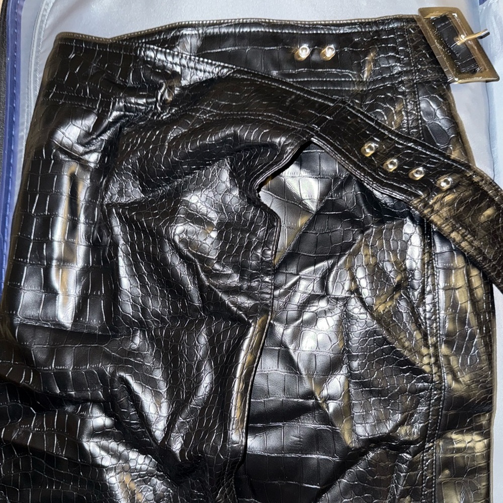Leather midi skirt. Comes with the belt